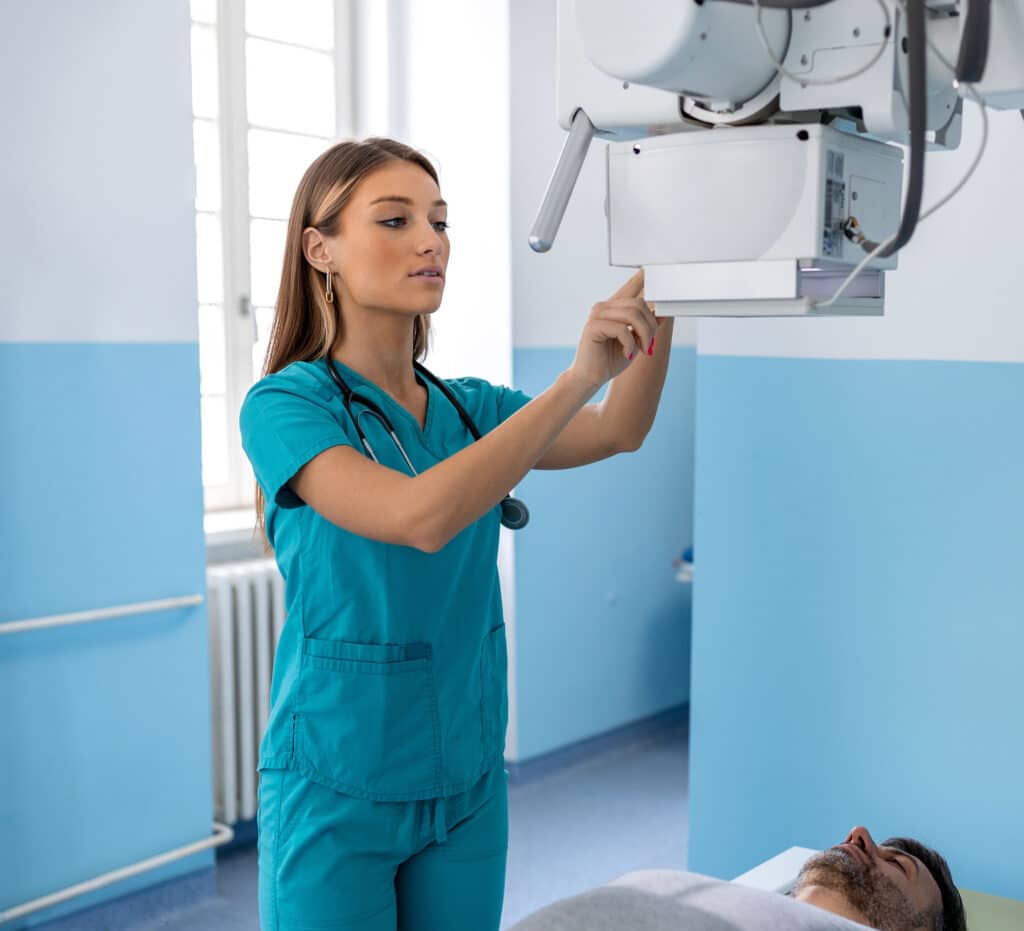 Radiologist and patient in a x-ray room